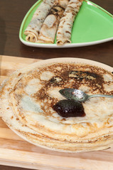 Strawberry jam marmalade spoon pancakes plate