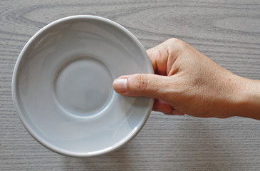 saucer in hand