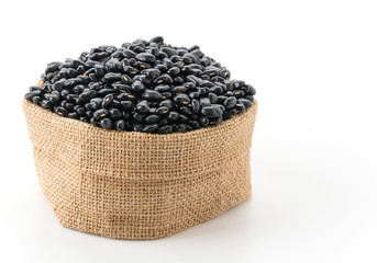 Fototapeta na wymiar black beans on white background