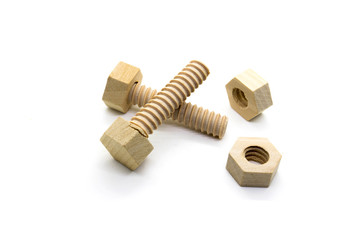 Wooden nuts and bolts isolated on white background