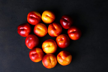 peaches on a black background