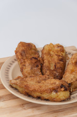 Fried paprika stuffed with cheese and served