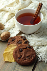 tea and cookies on wooden background