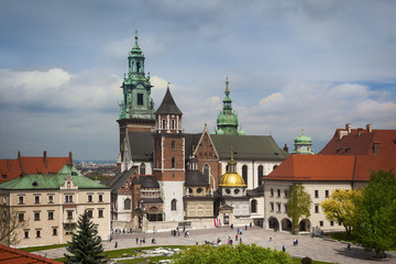 Obraz premium Krakow Wawel castle towers roof view with tourists, Poland,