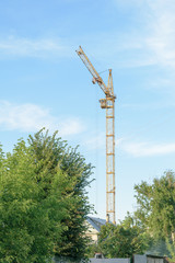 Obraz premium One tower crane on the construction of new apartment house