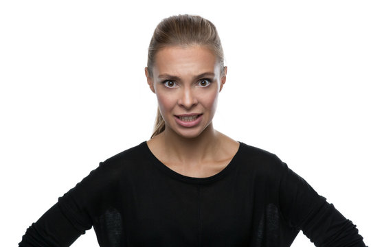 Portrait Of Angry Woman On White Background