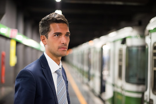 Businessman waiting for the subway train