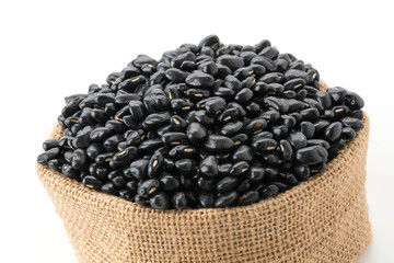 Fototapeta na wymiar black beans on white background