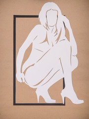 girls silhouettes cut from paper