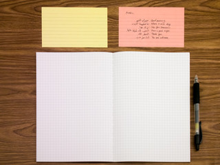 Arabic; Learning New Language Writing Words on the Notebook
