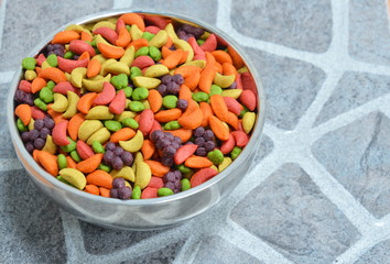 bird food on stainless bowl