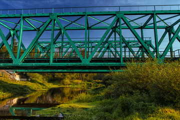 Green metal railway bridge