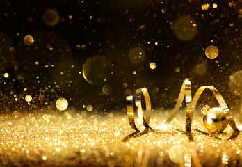 Golden Streamers With Sparkling Glitter

