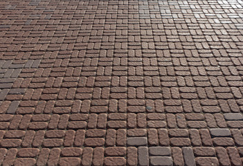 Red and grey pavement texture.