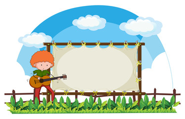 Man playing guitar in the park