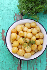 young boiled potatoes with butter and dill