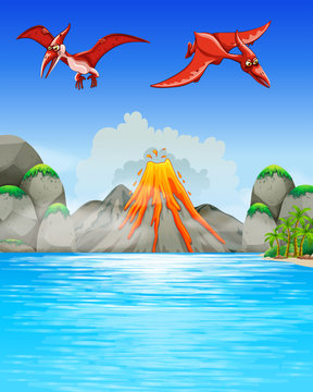 Dinosaurs flying over volcano