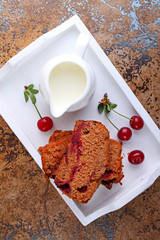 chocolate cake with cherries and milk