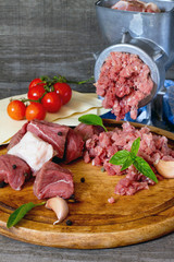 Beef, onion, raw meat, lasagna sheets, cherry tomatoes and grind