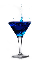 Blue cocktail splash in martini glass