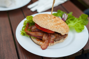 A close-up of tasty- look hamburger.