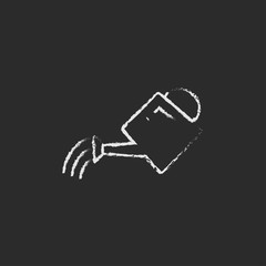Watering can icon drawn in chalk.