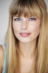 Naklejka premium Portrait of beautiful blond woman, smiling