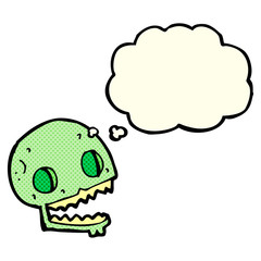 cartoon spooky skull with thought bubble