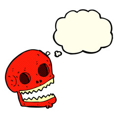 cartoon spooky skull with thought bubble
