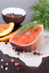 fresh salmon steak and ingredients for cooking