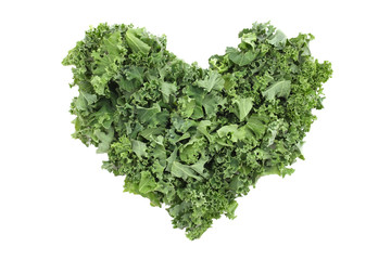 Shredded kale in a heart shape - obrazy, fototapety, plakaty