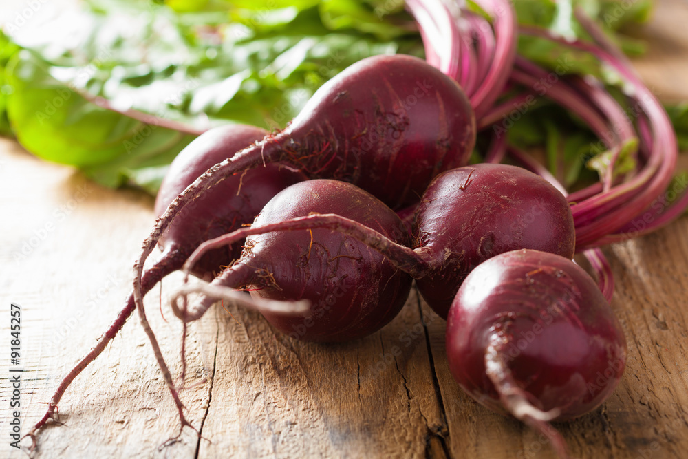 Sticker fresh beetroot on wooden background