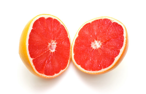grapefruit halves on white background