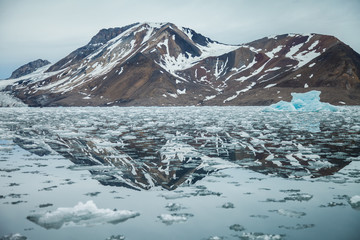 Fototapeta na wymiar Island and iceberg