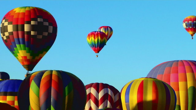 Colorful balloons rise above the Albuquerque Balloon Festival.