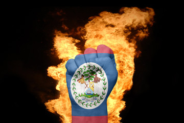 fire fist with the national flag of belize