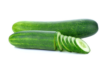 Cucumber and slices isolated over white background.