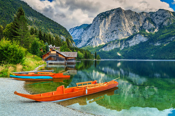 Boathouse and wooden boats on the lake,Altaussee,Salzkammergut,Austria - Powered by Adobe