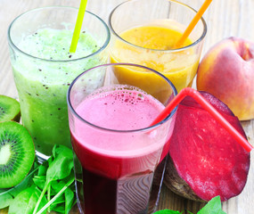 Fresh Detox Juices with Beet, Peaches, Spinach and Kiwi Fruit an