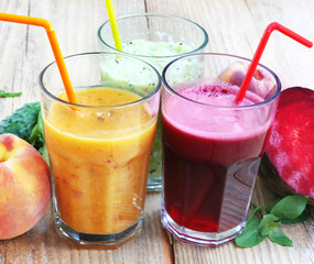 Fresh Detox Juices with Beet, Peaches, Spinach and Kiwi Fruit an