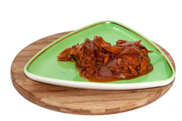 Canned tuna with tomato sauce on a plate