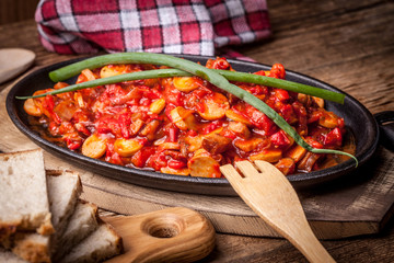 Lecho - stew with peppers, onions and sausages.