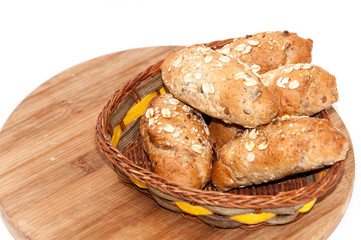 Rolls with integral flour and grain in a basket