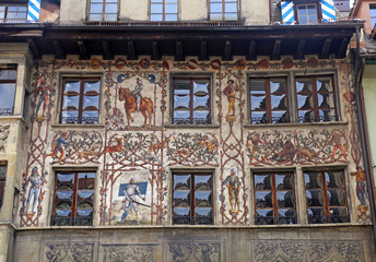 Old beautiful fresco on medieval building in Lucern, Switzerland