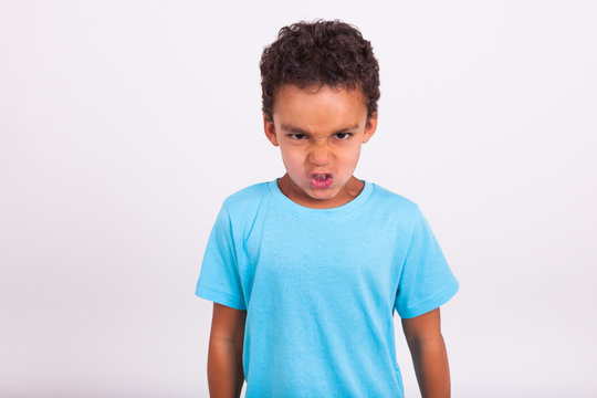 Portrait Of A Angry Little African American Boy