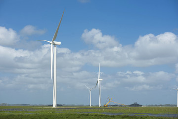 Green energy ecology windmill field sky background