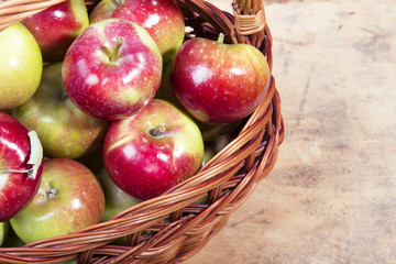 tasty apples in a wicker basket
