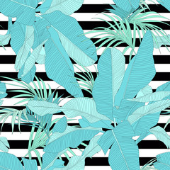trendy tropical fabric seamless pattern, palm leaves on black and white stripes, vector illustration