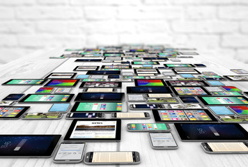 devices collection over wooden table