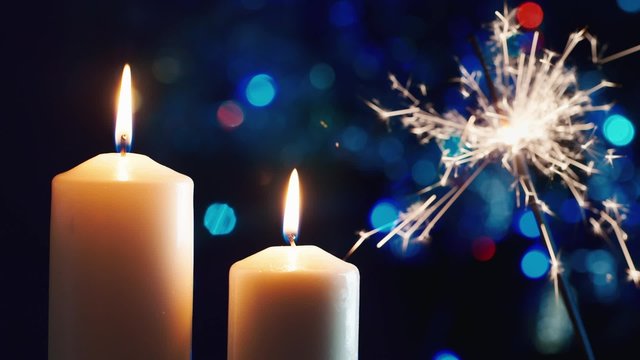 Christmas candles, lit sparkler